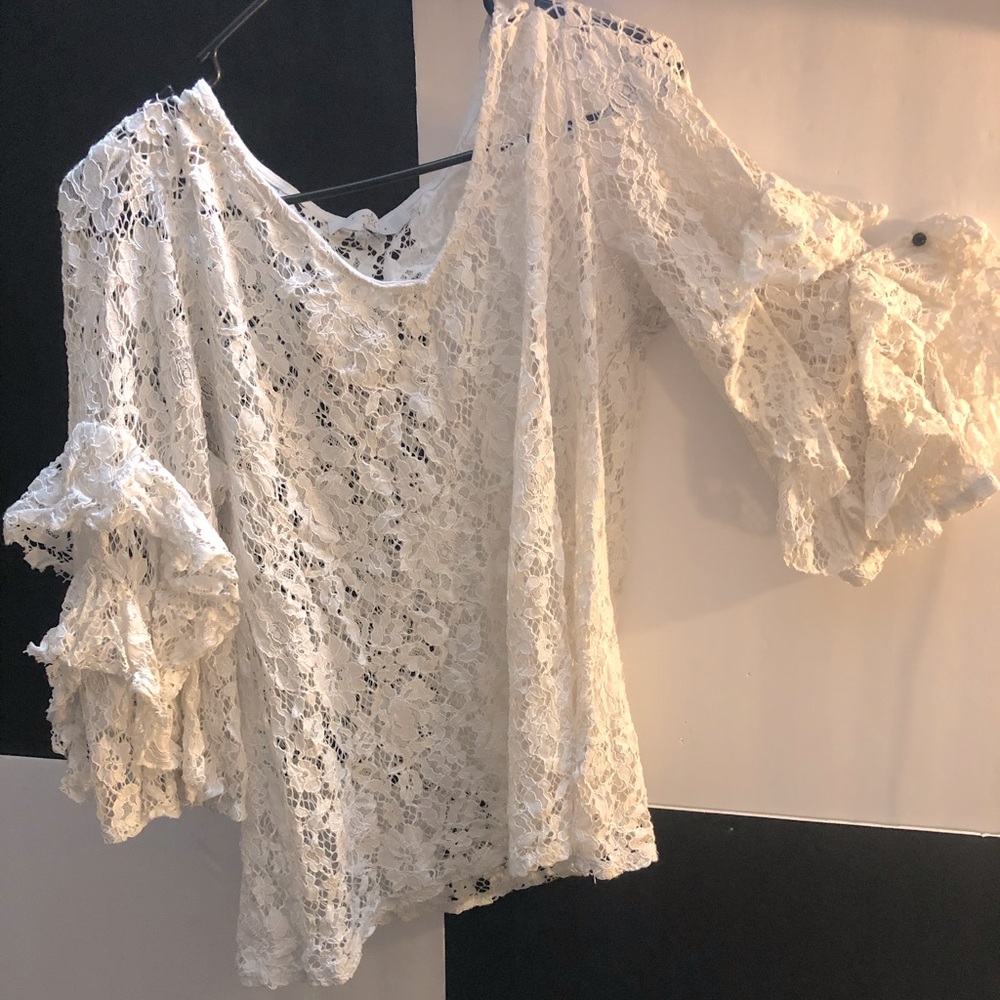 Women’s lace blouse with layered ruffled sleeves